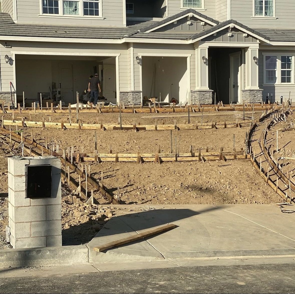 Front yard terraced and formed for concrete pour