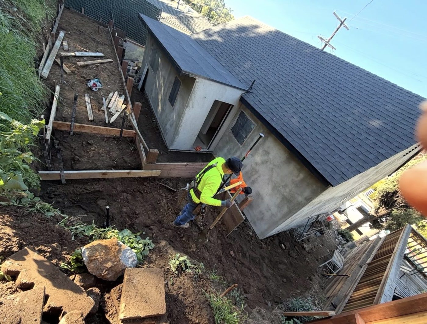 Crew forming steps on a steep slope